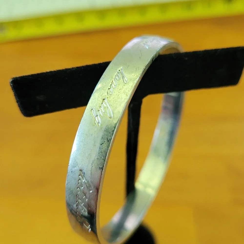KATE SPADE Be Mine Idiom Silver Tone Engraved Bangle Bracelet